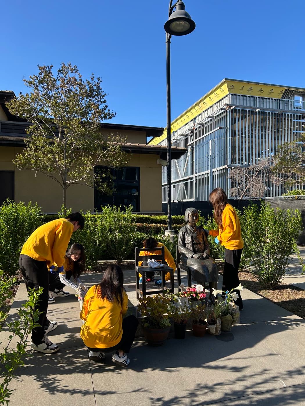 Hwarang students caring for the Peace Monument in Glendale, California