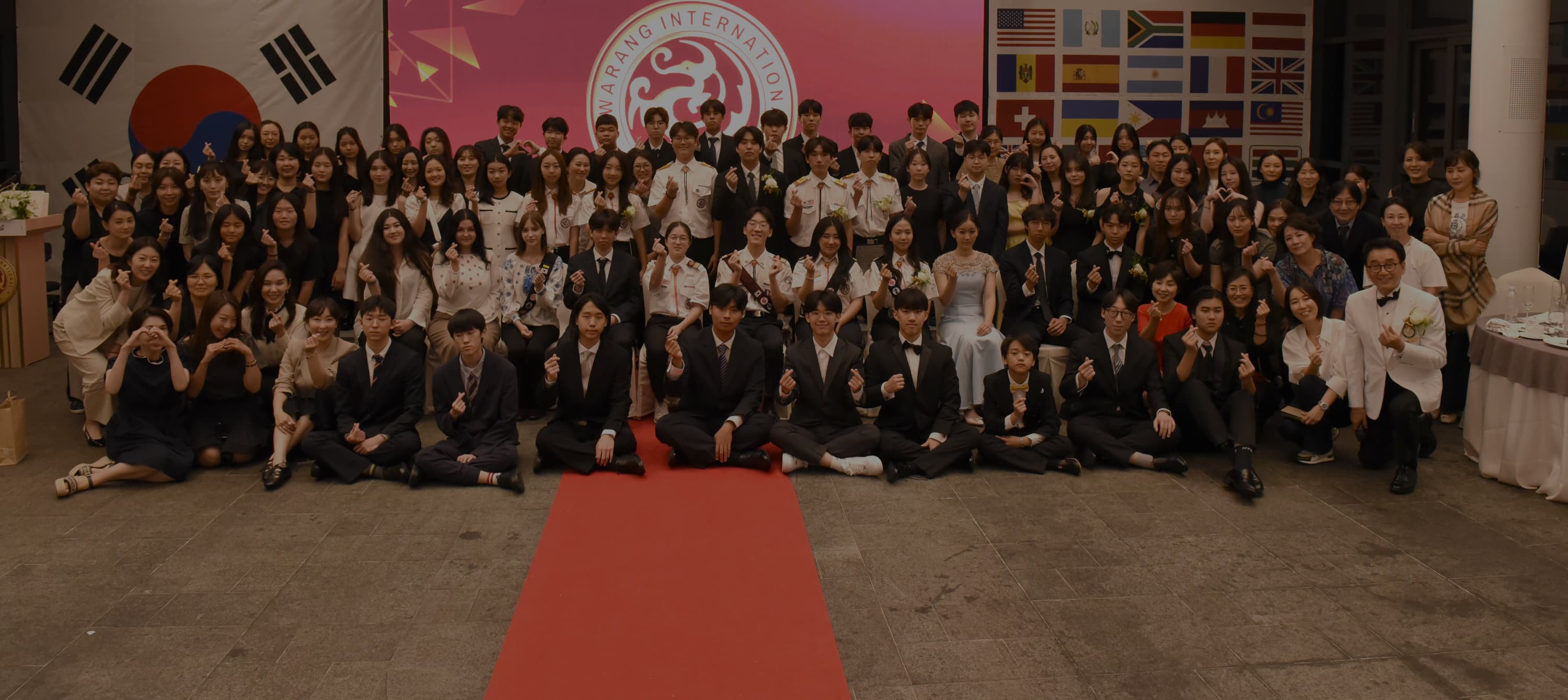 Large group photo at a graduation ceremony event