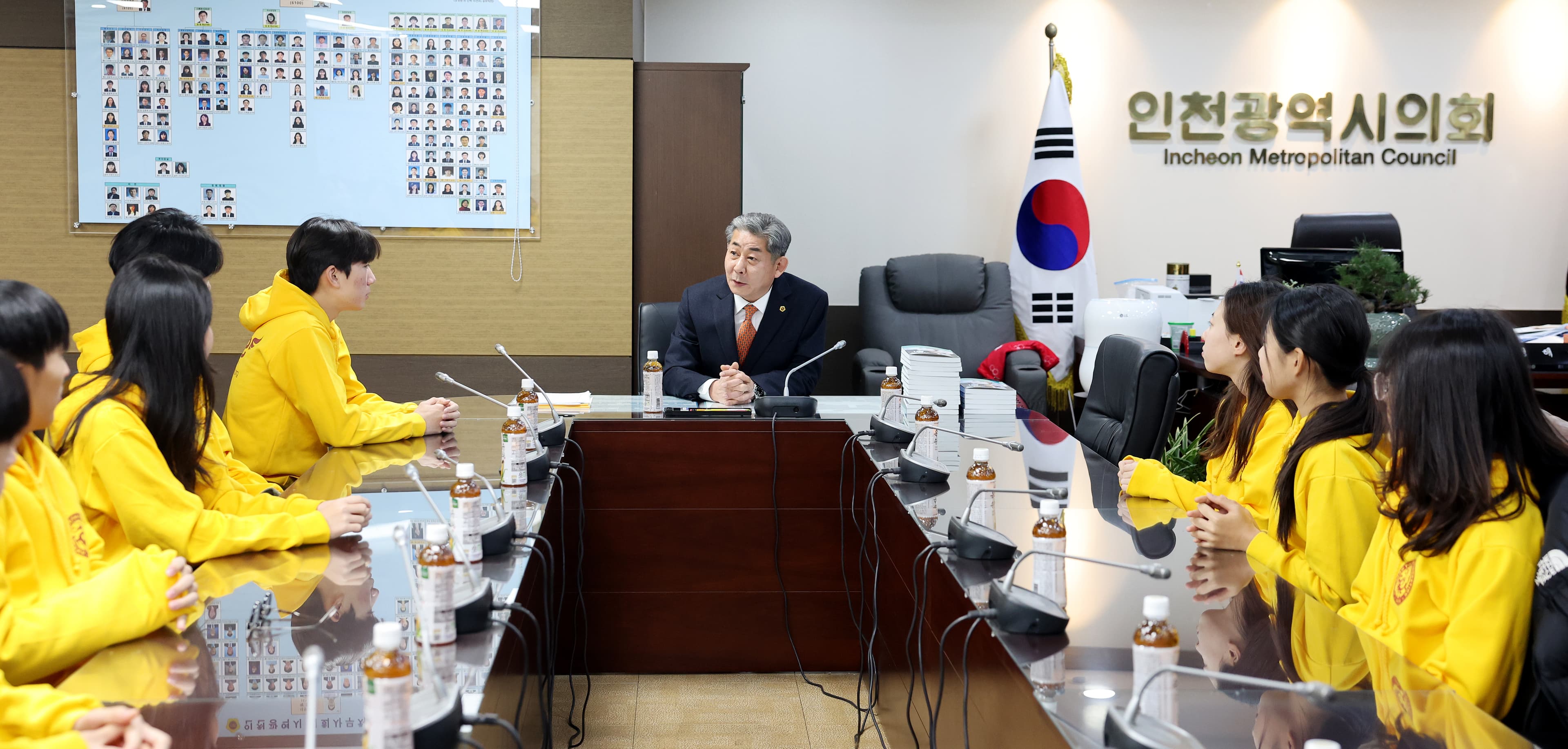 Board meeting in a conference room with partners